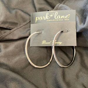 Hematite with channel set crystal earrings.